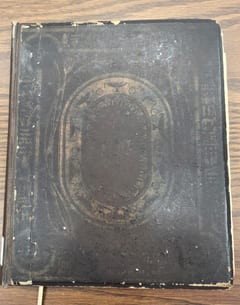 C067 original brown-and-gold publisher-issued front board thumbnail