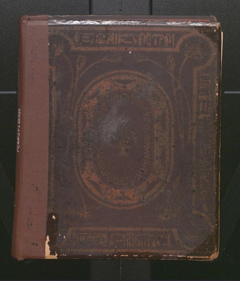 C056 original brown decorated front board beneath later rebind