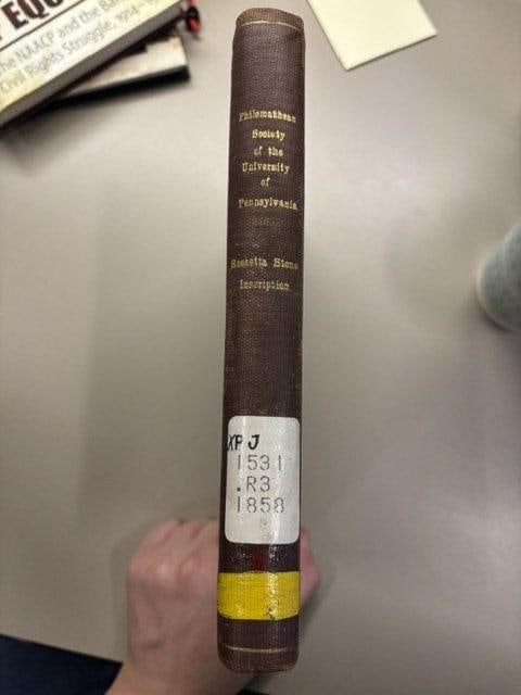 C065 spine with Enoch Pratt shelf label and gilt title