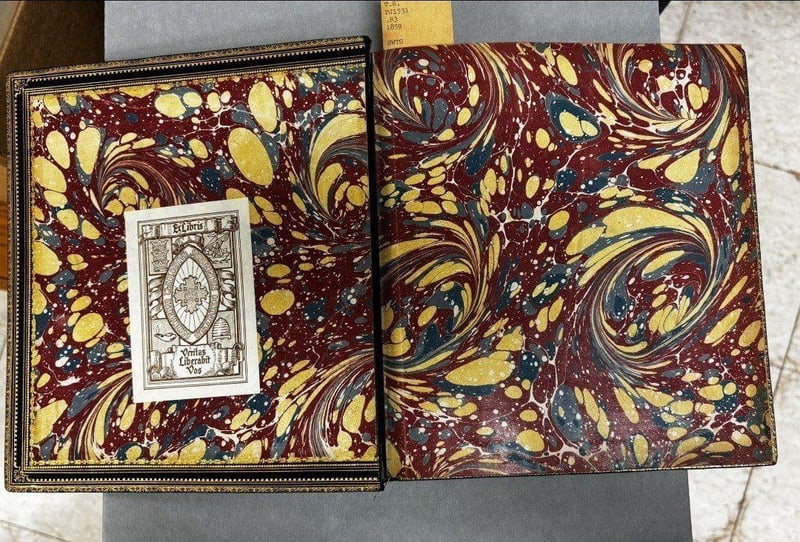 C074 marbled pastedown with Ex Libris bookplate