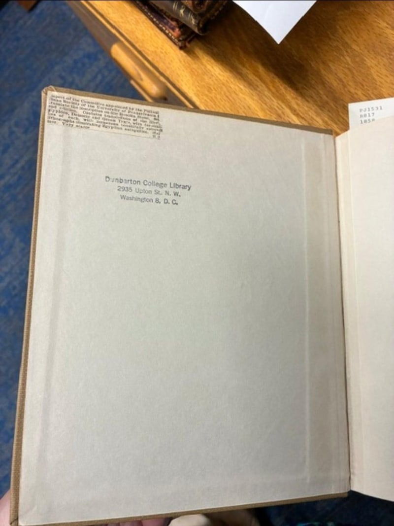 C075 inside front cover with Dunbarton College Library stamp and pasted bookseller clipping