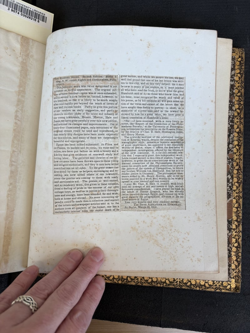 C062 inserted newspaper clipping concerning the Rosetta Stone report