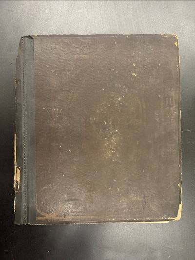 C053 heavily rubbed original brown publisher-issued front board